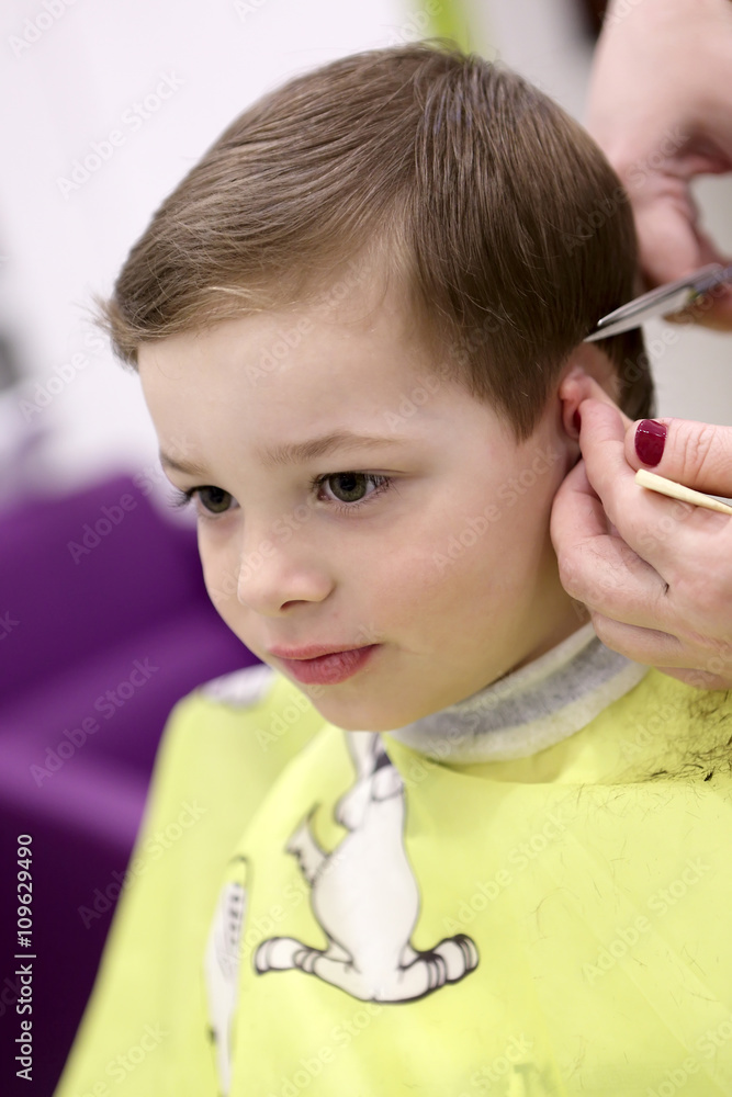 Child at the barbershop Child at the barbershop