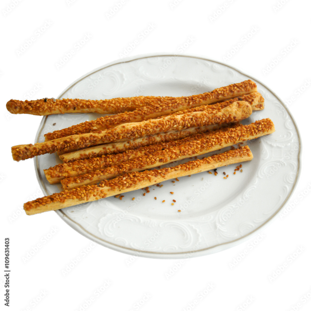 Delicious appetizer crispy sticks of puff pastry with sesame see Delicious appetizer crispy sticks of puff pastry with sesame see