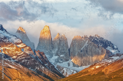 Lighting of the Torres del Paine at sunrise, Chile