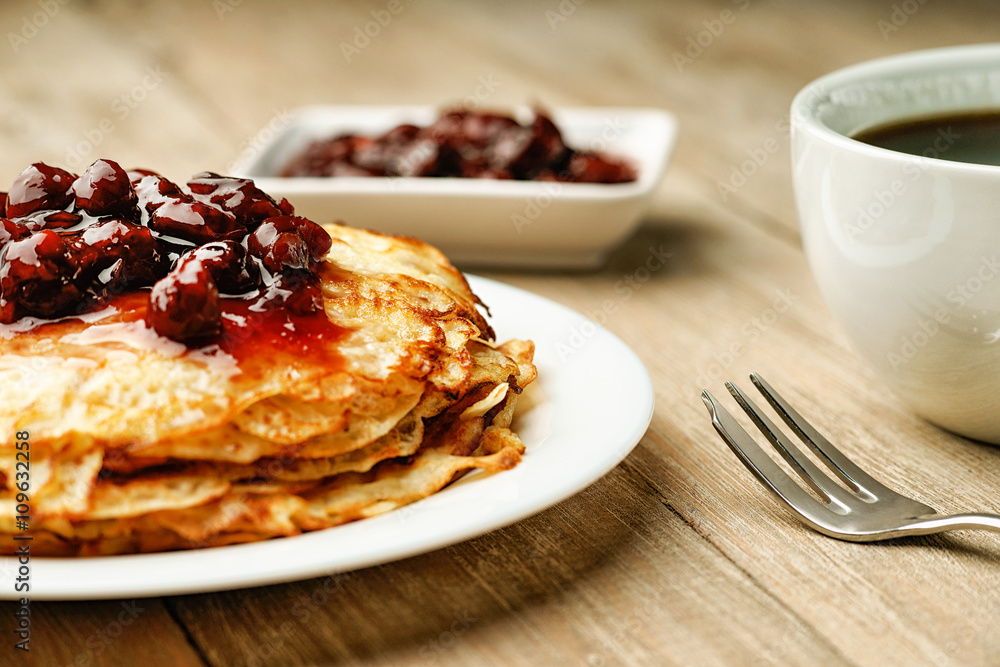 Pancakes, jam and coffee