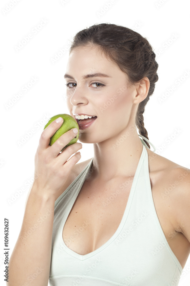 woman about to eat a green apple woman about to eat a green apple