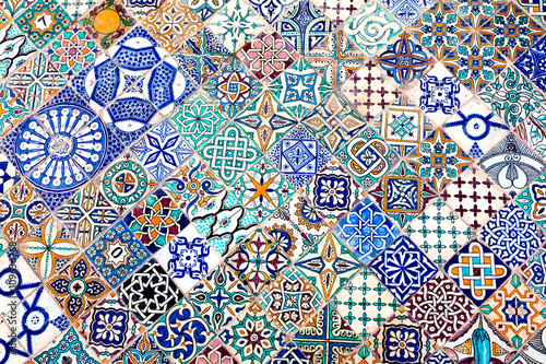 mosaic formed by tiles of different designs