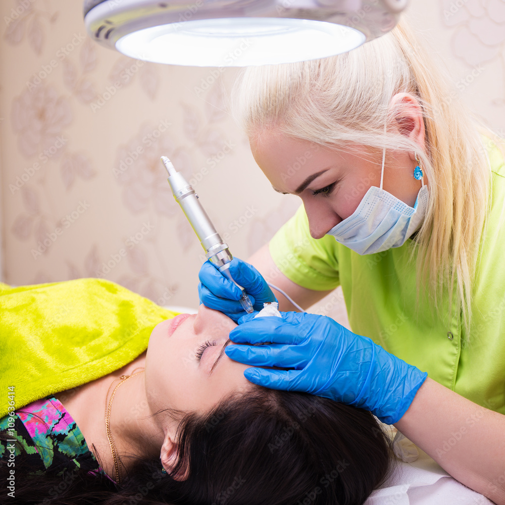 permanent make up - professional cosmetologist working in salon permanent make up - professional cosmetologist working in salon