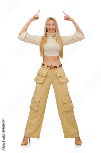 Pretty woman in beige trousers isolated on white