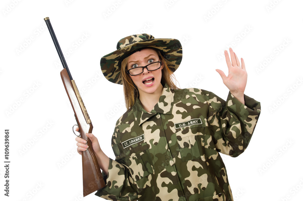 Girl in military uniform holding the gun isolated on white Girl in military uniform holding the gun isolated on white