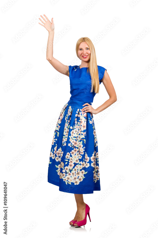 Woman in long blue folral dress isolated on white