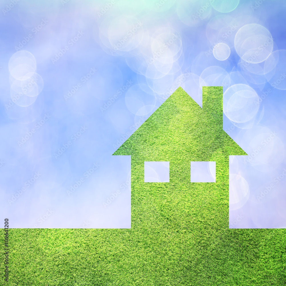Conceptual eco green house copy space background with grass texture and blurred bokeh blue sky. Friendly living in eco green modern home. Square composition. Conceptual eco green house copy space background with grass texture and blurred bokeh blue sky. Friendly living in eco green modern home. Square composition.