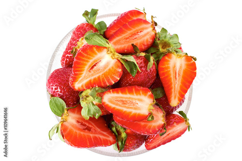 White bowl of strawberries on white