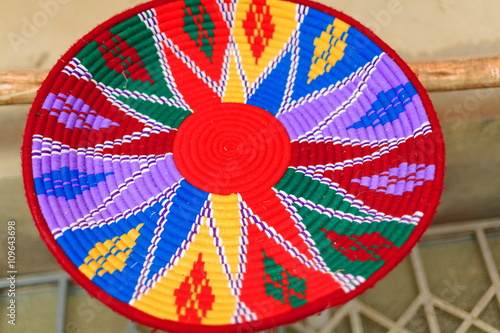 Colorist basketry underplate for injera food. Mekelle-Ethiopia. 0463 photo