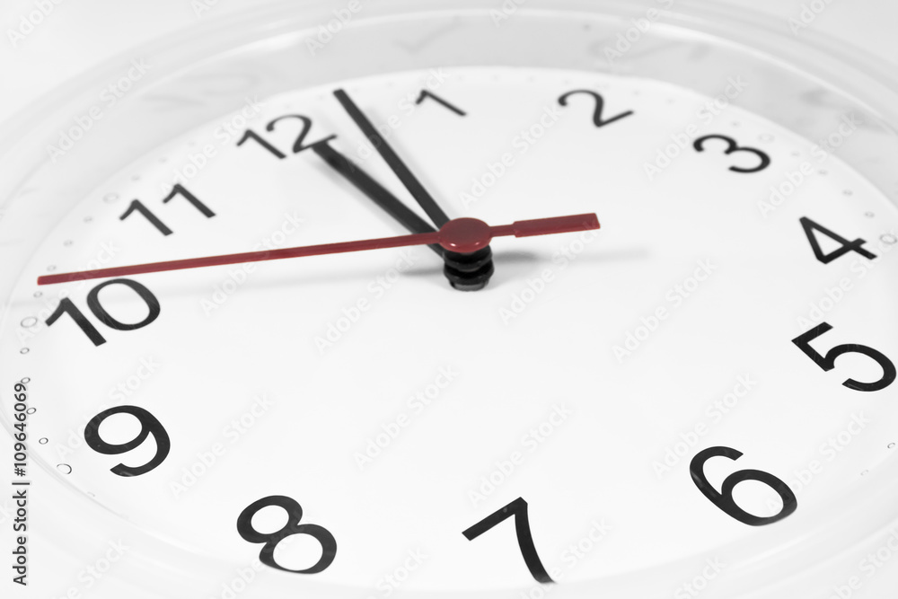 Closeup of hands on clock face.sensitive focus Closeup of hands on clock face.sensitive focus