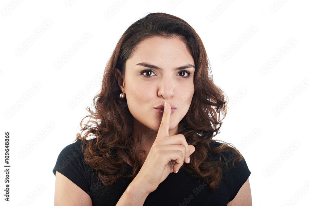 Naklejka premium young woman with finger to lips