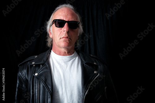 older grey haired biker