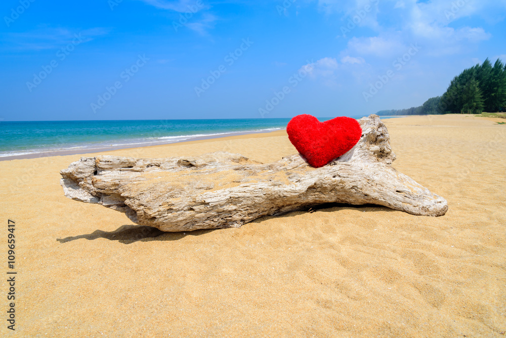 Close up red hearts on ocean beach sand - love concept for holiday. Close up red hearts on ocean beach sand - love concept for holiday.