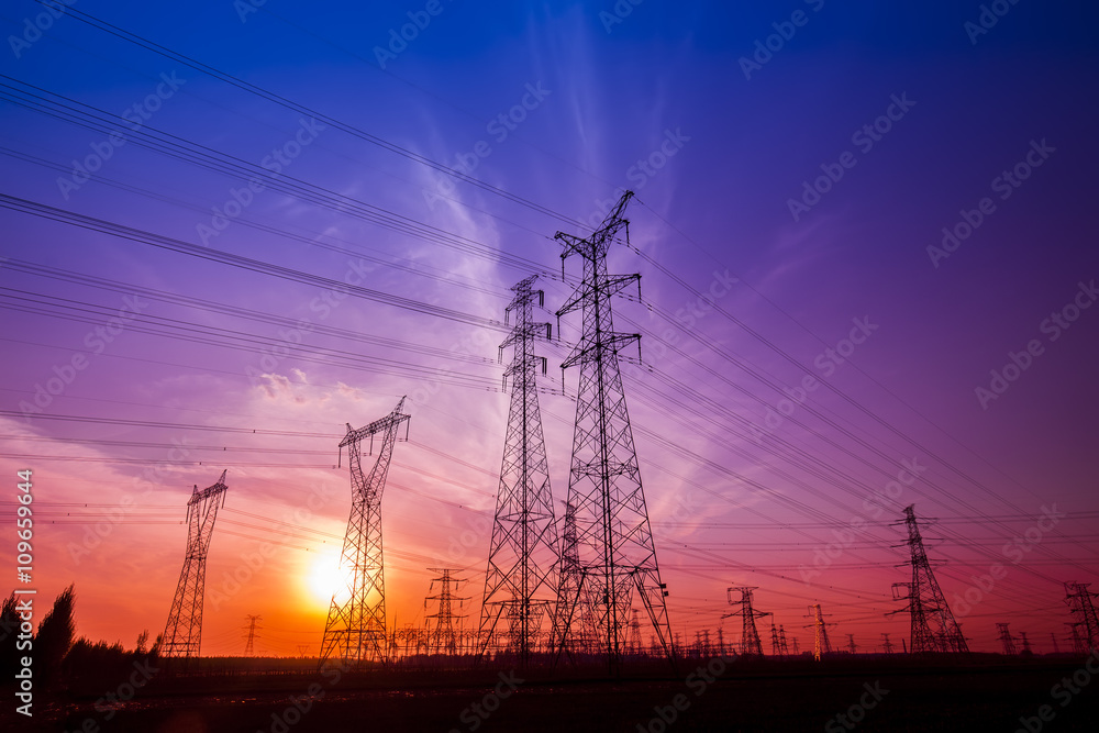 The silhouette of the evening electricity transmission pylon The silhouette of the evening electricity transmission pylon