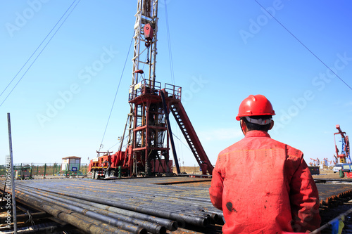 Oil field, the oil workers are working