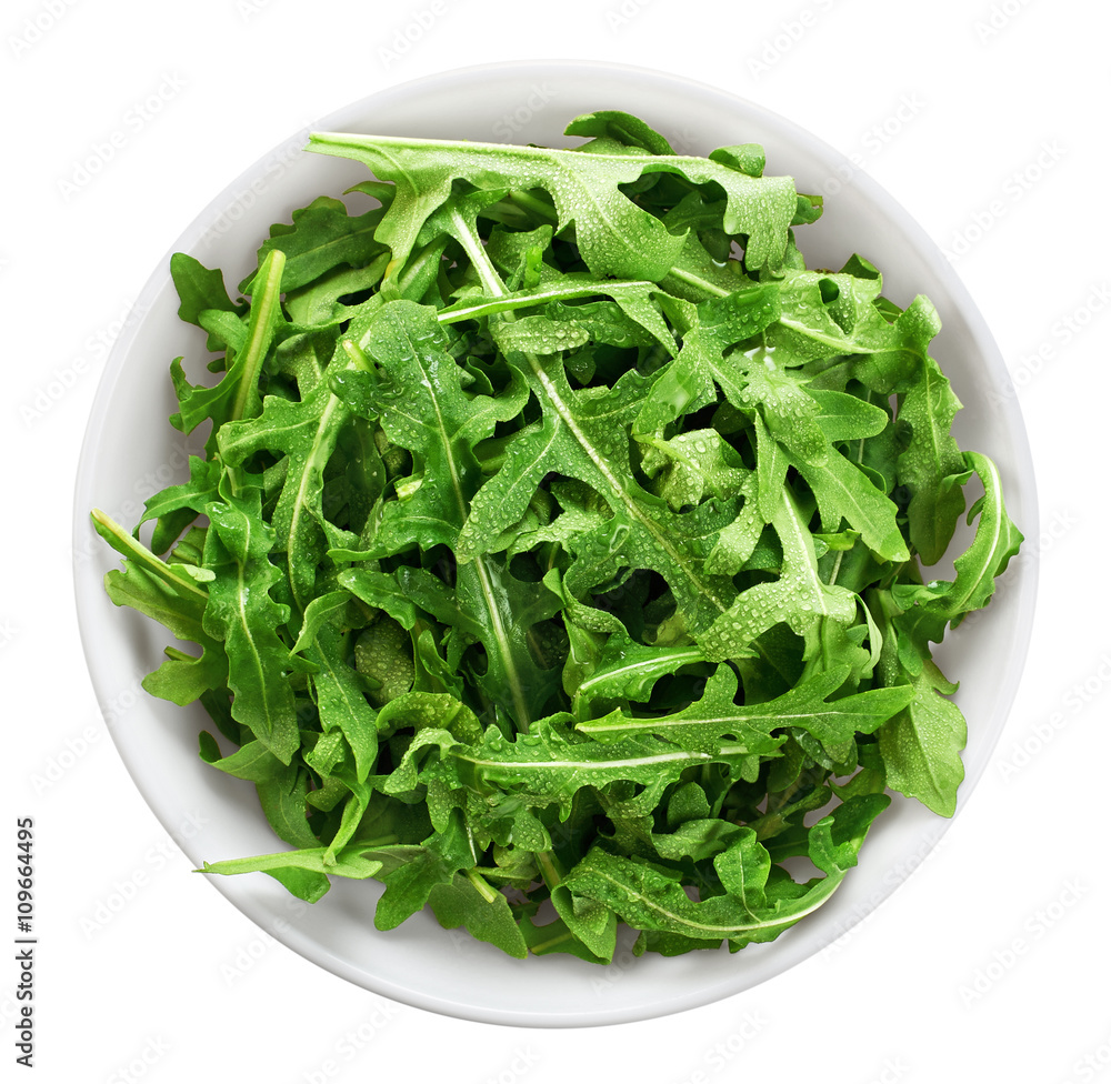 Bowl with fresh green salad arugula isolated on white background Bowl with fresh green salad arugula isolated on white background