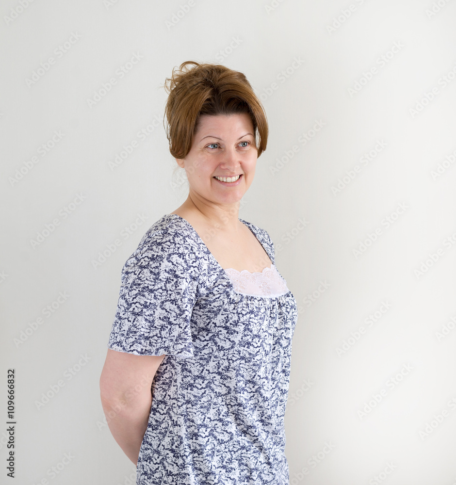 Woman in pajamas on light background Woman in pajamas on light background