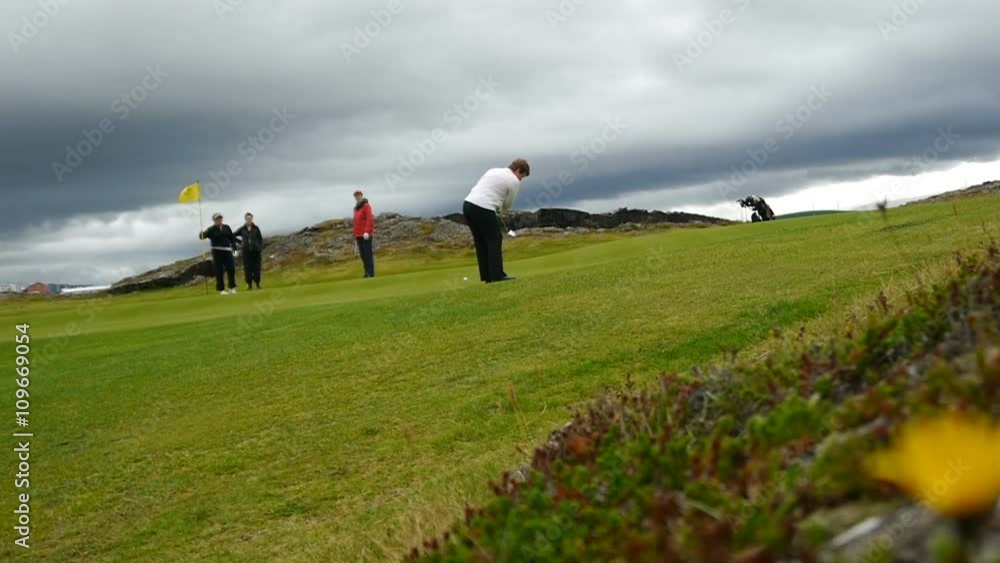 A golf course in Iceland. Golf Course on the outskirts of Reykjavik, among the rocks of the lava A golf course in Iceland. Golf Course on the outskirts of Reykjavik, among the rocks of the lava