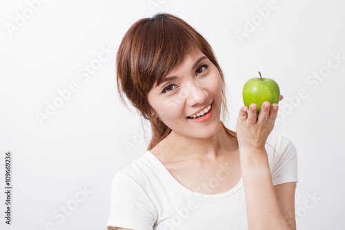 healthy asian woman with green apple
