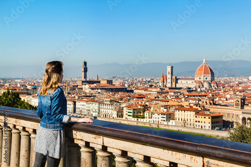 Young girl enjoying the panoramic view of Florence, Tuscany, Italy