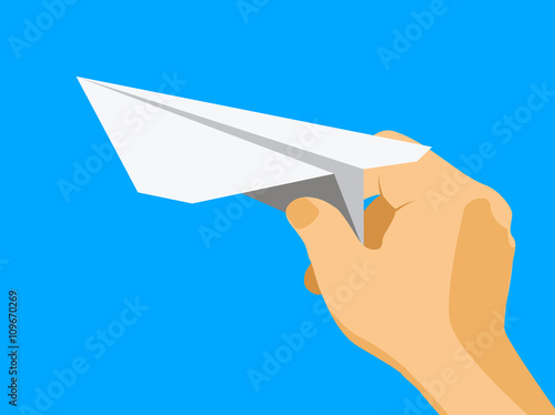 Child hand with paper plane