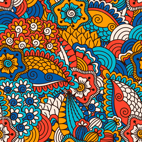 Hand drawn seamless pattern with floral elements. Colorful ethnic background. Pattern can be used for fabric, wallpaper or wrapping