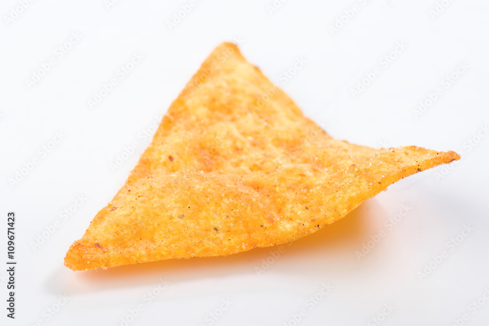 spicy nachos isolated on white