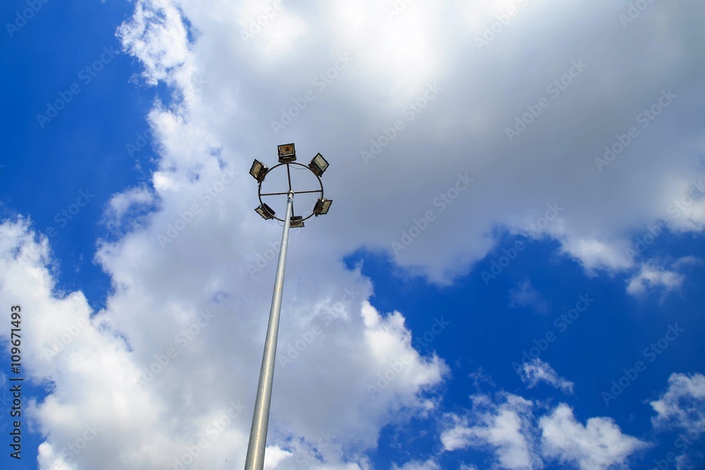 Lamppost with four lamps over on the sky Lamppost with four lamps over on the sky