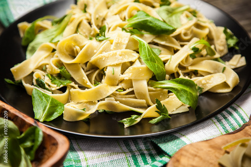 Cooked tagliatelle on a plate photo