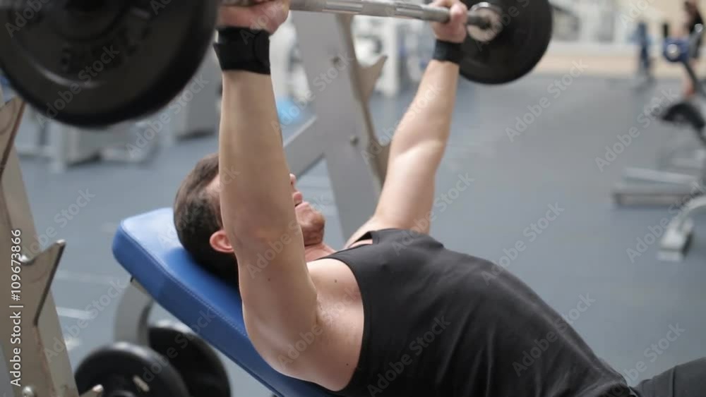 Man bench pressing weights Man bench pressing weights