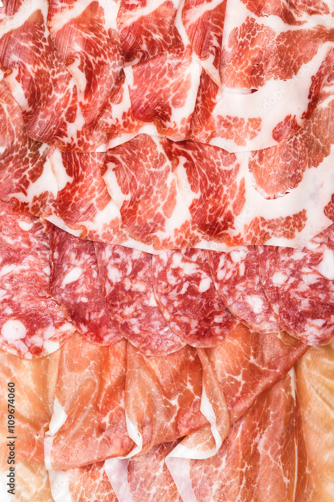 Antipasti composition of italian cured meat types. 