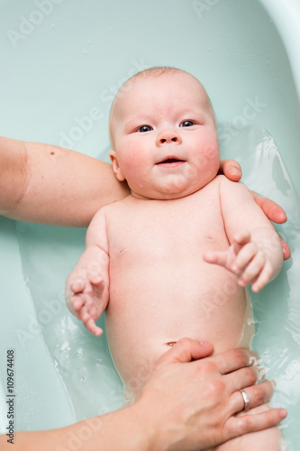 Baby girl taking a bath