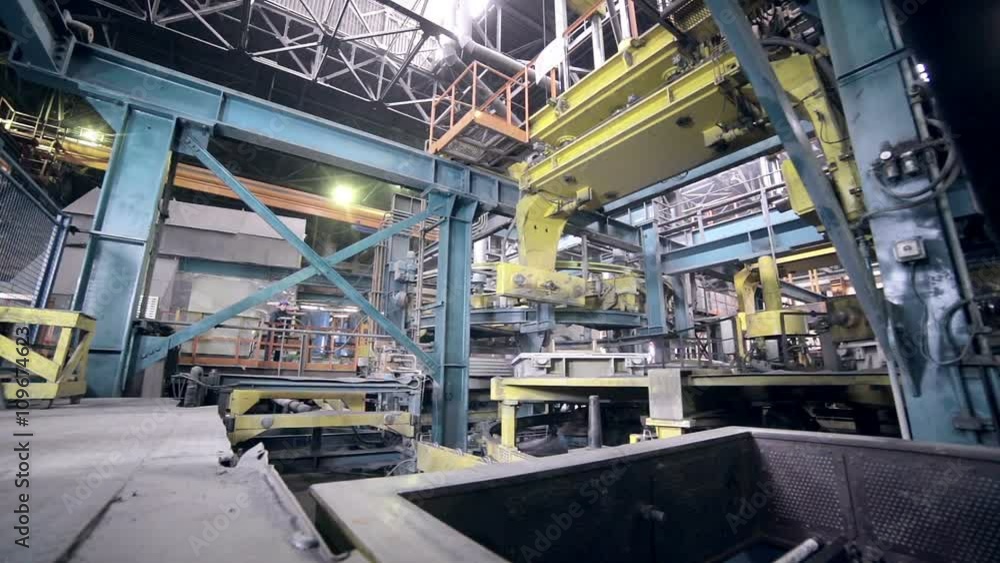 Automated robotics welding line at a heavy industry plant. HD. Automated robotics welding line at a heavy industry plant. HD.