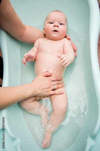 Baby girl taking a bath