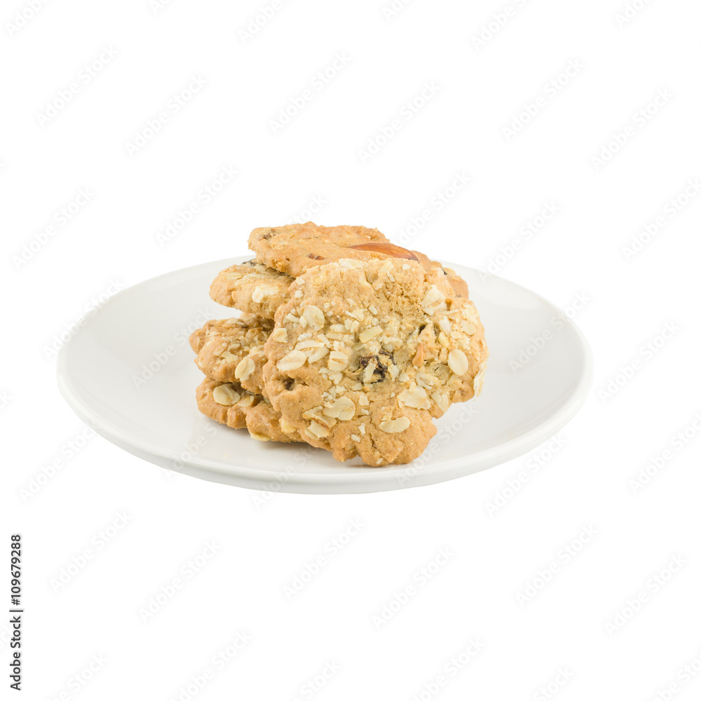 whole grains cookies on White plate isolated on white background
