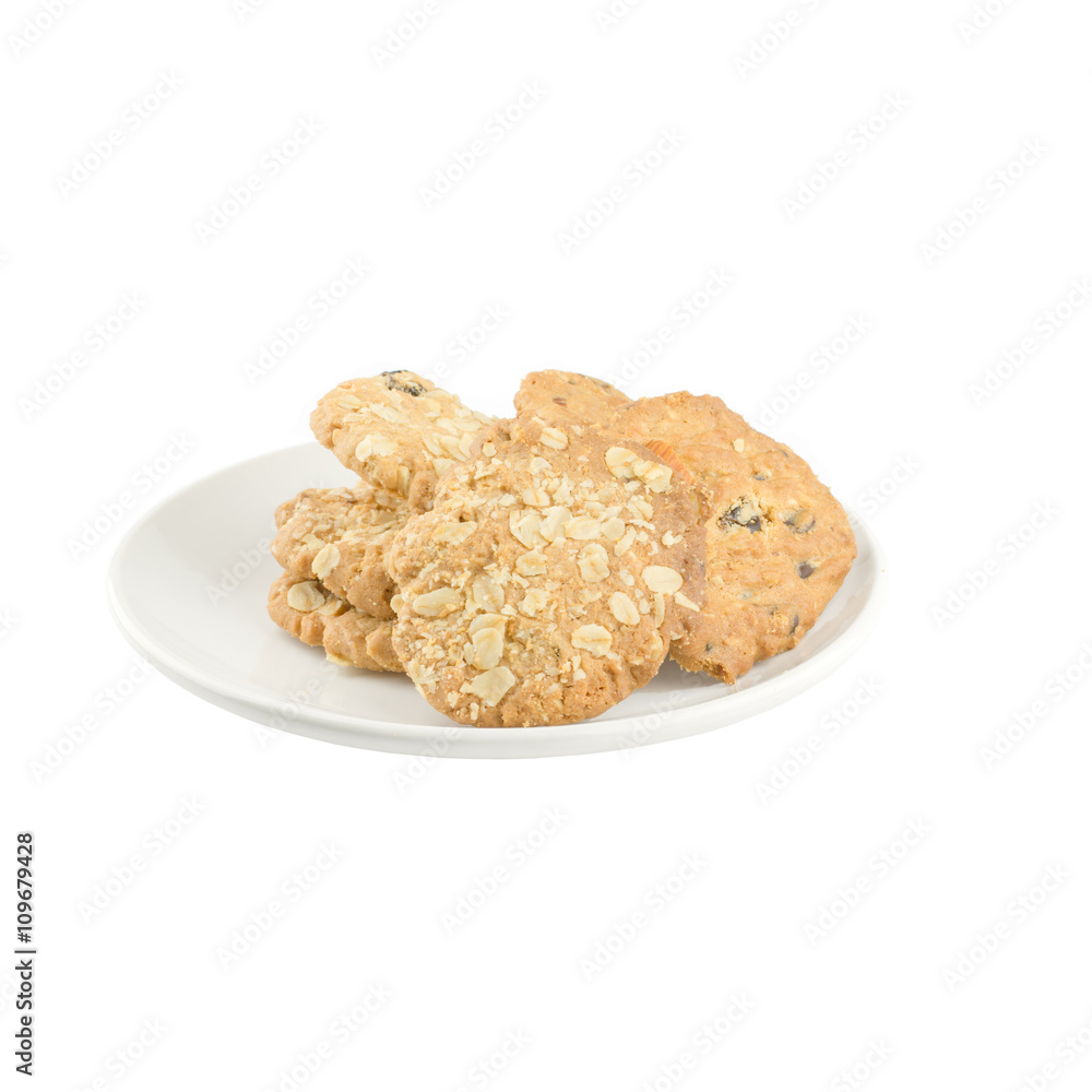 whole grains cookies on White plate isolated on white background whole grains cookies on White plate isolated on white background