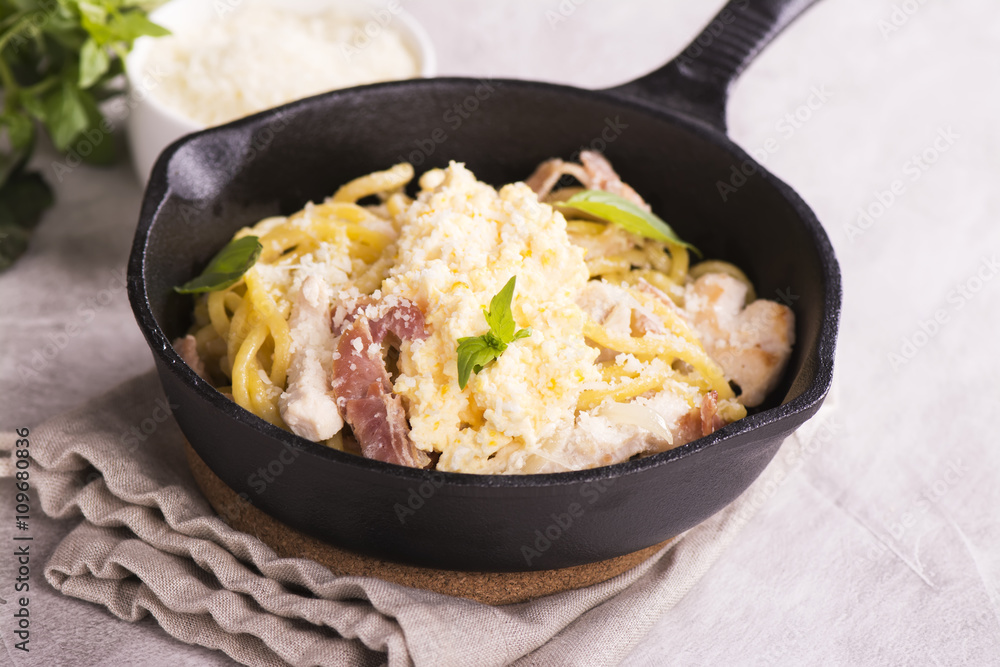 Pasta with bacon, chicken, parmesan and scrambled egg Pasta with bacon, chicken, parmesan and scrambled egg