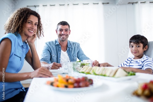 Family sitting at breakfast table