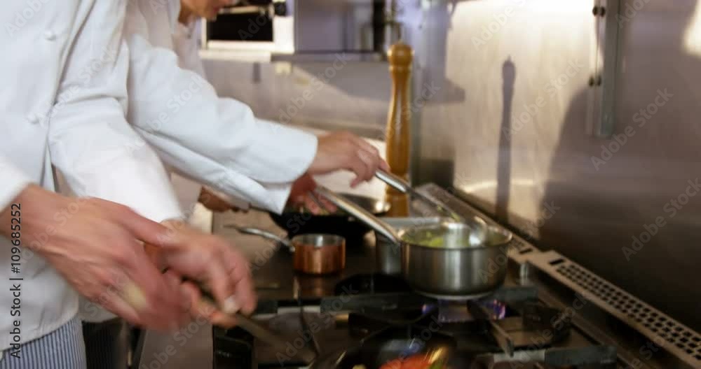 Two chefs preparing food Two chefs preparing food