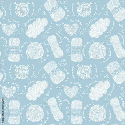 Seamless pattern with blue balls of yarn for knitting