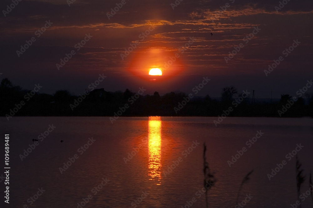 Reflection of the sunset on the lake Reflection of the sunset on the lake