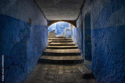 A tunnel in a street of the town in Chefchaouen, in Morocco