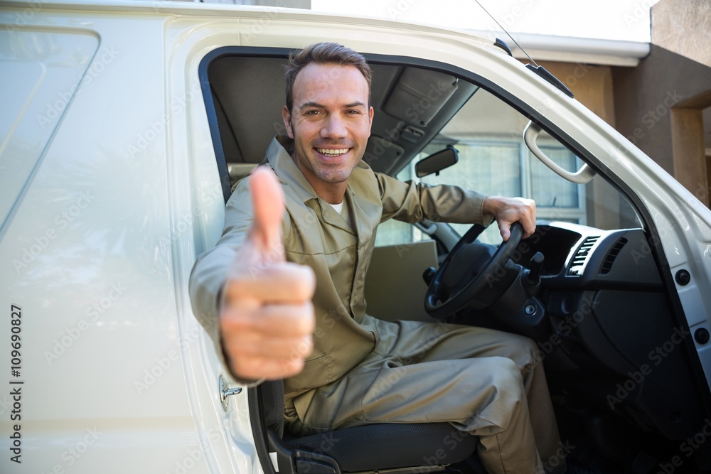 Delivery man sitting in his van Delivery man sitting in his van