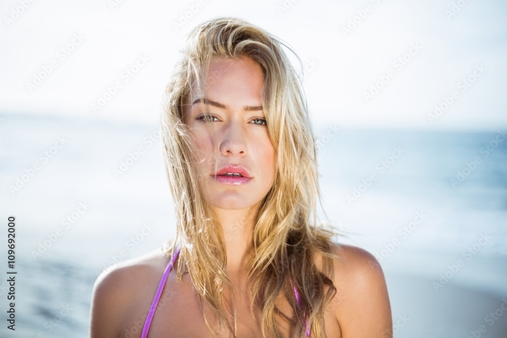 Beautiful woman posing on the beach Beautiful woman posing on the beach