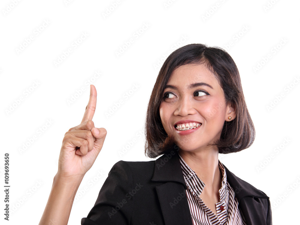Cheerful businesswoman pointing finger up Cheerful businesswoman pointing finger up
