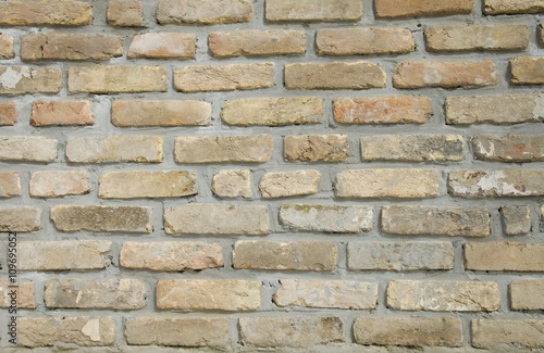 Gradient Beige brick wall. Texture