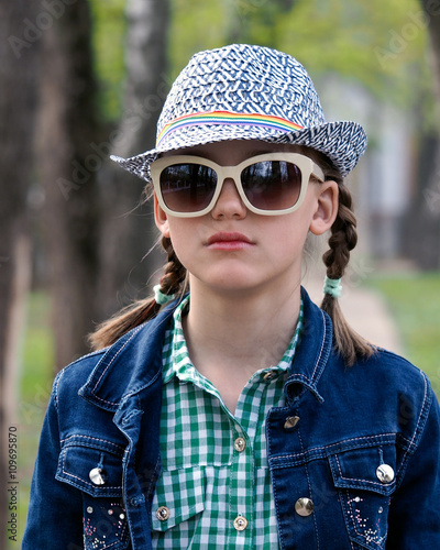 Portrait of a teenager girl glasses hat © kozorog