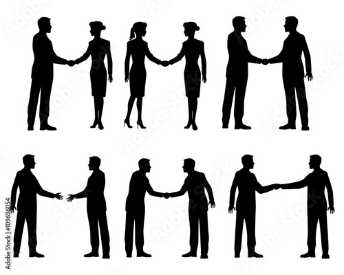 Businessmen handshake silhouettes
