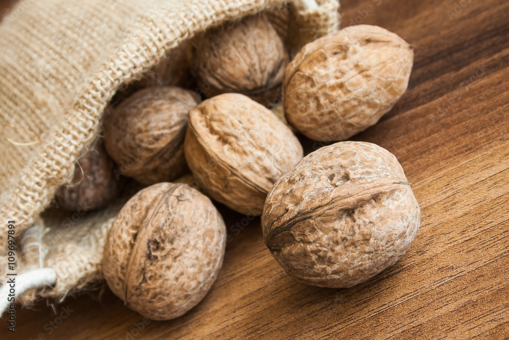 Organic walnuts in small storage bag.