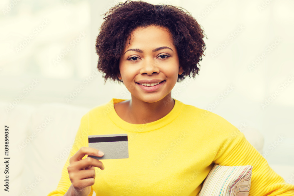 happy african woman with credit or debit card happy african woman with credit or debit card